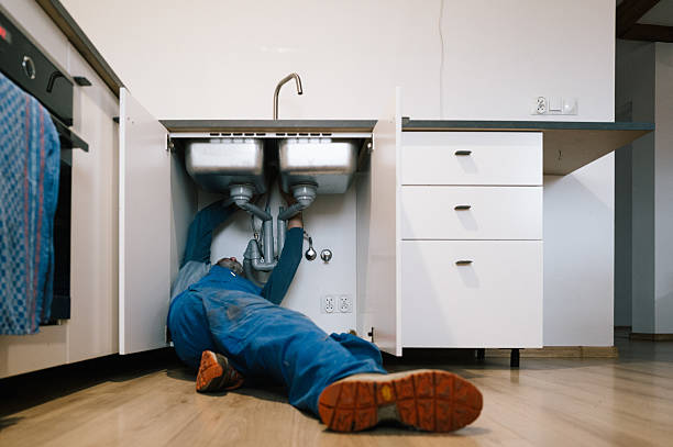 Professional Emergency Plumber technician working in Witt, IL